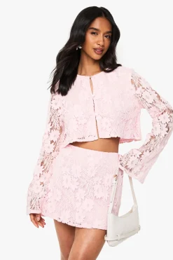 boohoo Petite ensemble coordonné en crochet pour petites tailles : haut à manches longues et mini-jupe<Femme Ensembles