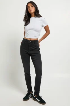 Petite jean skinny à taille haute rehausse-fesses