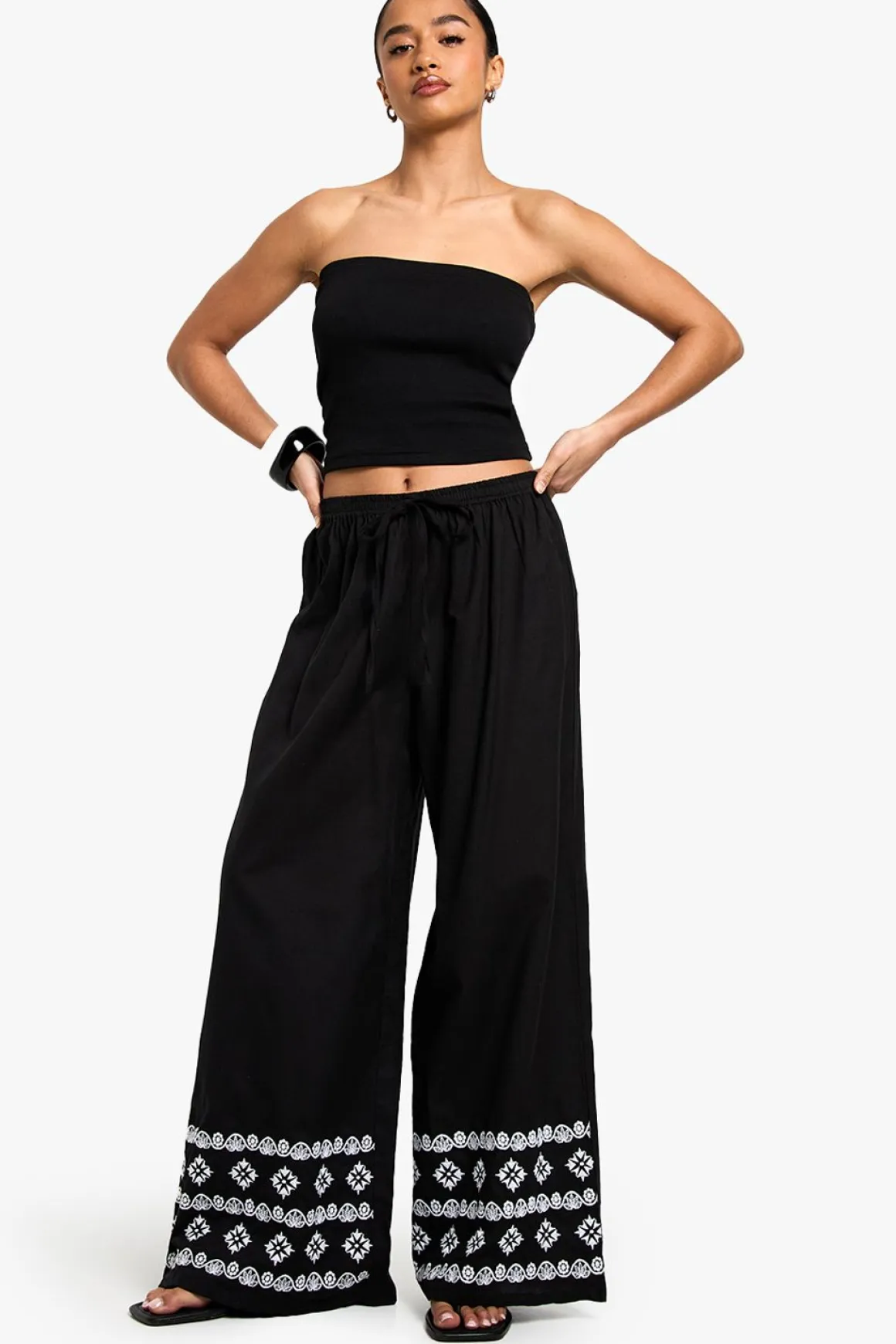 Petite Pantalon à jambes larges avec ourlet brodé