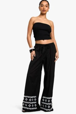 Petite Pantalon à jambes larges avec ourlet brodé
