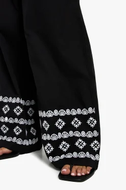 Petite Pantalon à jambes larges avec ourlet brodé