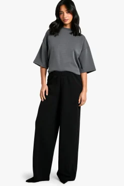 Petite pantalon stretch à jambes larges