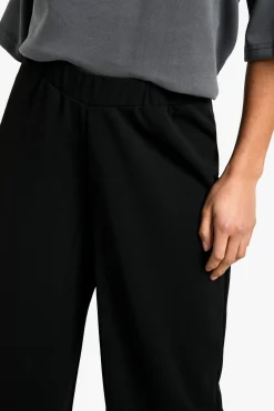 Petite pantalon stretch à jambes larges