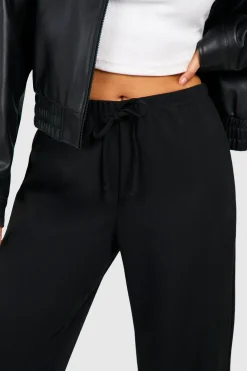 Petite Pantalon à Taille Nouée et Jambes Larges