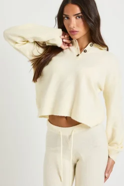 Petite pull en maille surdimensionné à col boutonné et pantalon à jambe droite coordonné