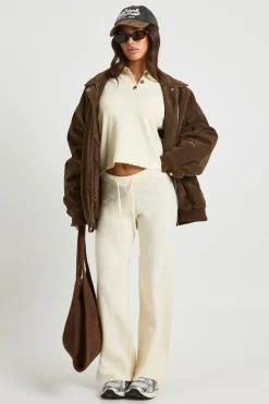 Petite pull en maille surdimensionné à col boutonné et pantalon à jambe droite coordonné
