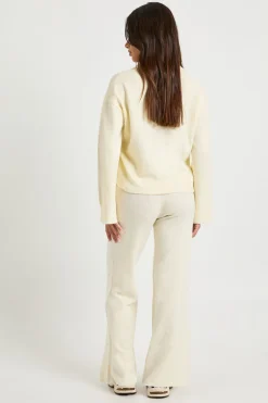 Petite pull en maille surdimensionné à col boutonné et pantalon à jambe droite coordonné