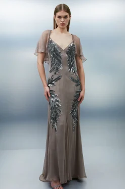 Petite Robe Maxi avec Manches Cape Tissées et Ornée de Plumes