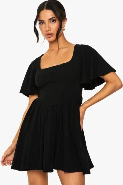 Petite robe patineuse en mélange de lin, corset, manches d'ange