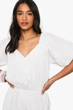 boohoo Petite robe skater mini à décolleté en V et manches bouffantes extrêmes<Femme Robes Courtes|Robes