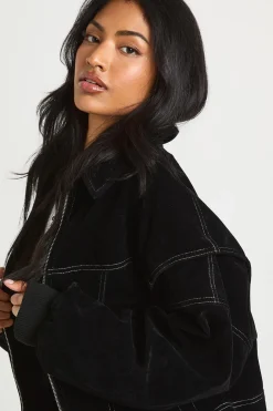 Petite veste bomber en suédé synthétique à surpiqûres contrastées