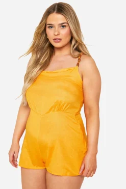 Playsuit grande taille à bretelles avec détails de perles tissées