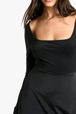 Playsuit skort à encolure échancrée et manches longues