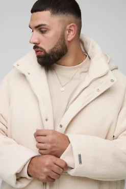 Plus, doudoune oversize à capuche en tricot, de coupe boxy