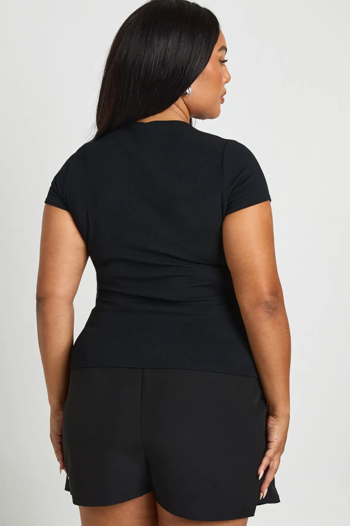 Plus Haut à manches cap asymétrique boutonné