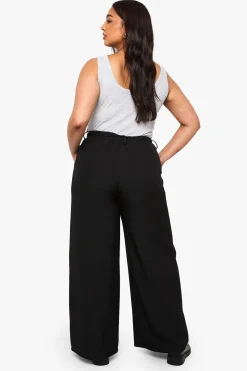 Plus pantalon à jambe large en tissu tissé et élastiqué avec ceinture nouable à l'arrière