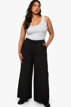 Plus pantalon à jambe large en tissu tissé et élastiqué avec ceinture nouable à l'arrière