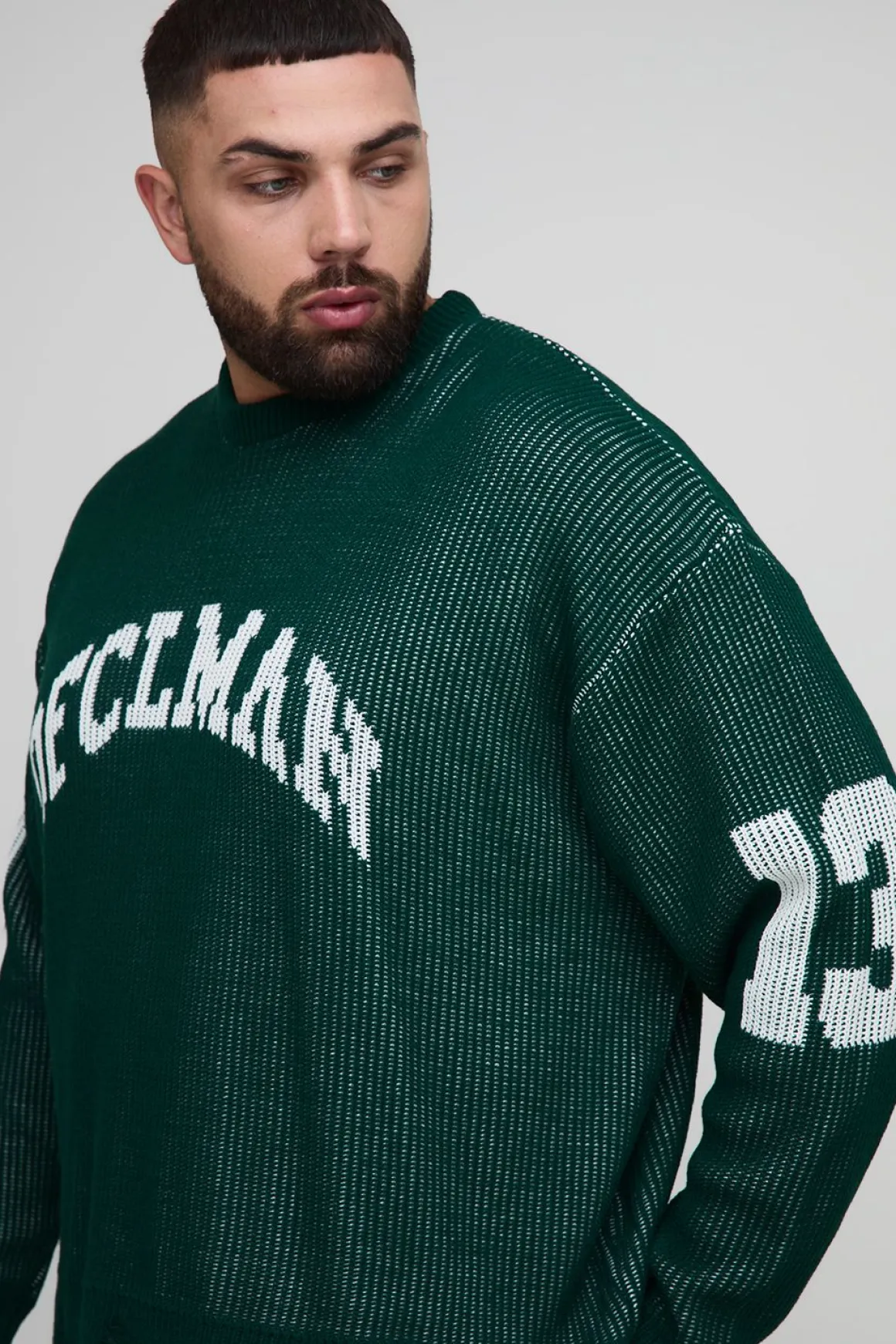 Plus Pull varsity surdimensionné en maille côtelée délavée