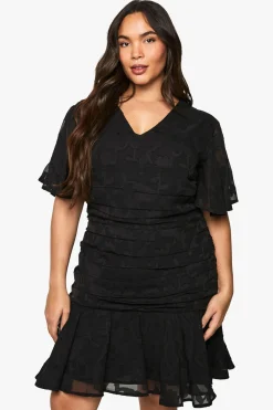 PLUS ROBE MINI EN JACQUARD FLORAL FRONCÉE AVEC OURLET À VOLANTS