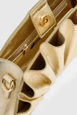 Pochette métallique à volants