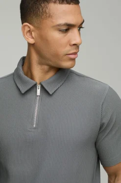 Polo à col zippé, manches courtes plissées, coupe régulière
