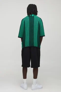 Polo de football tricoté surdimensionné, au design carré et rayé