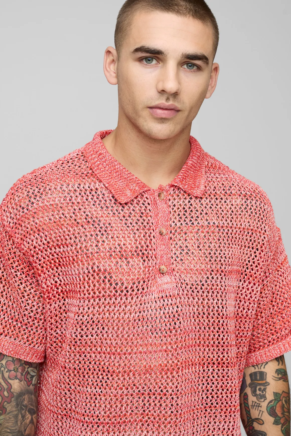 Polo en maille tricotée à col boutonné en fil torsadé surdimensionné
