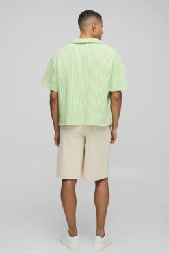 boohooMAN Polo en maille tricotée, coupe ample et carrée, col en V, rayures texturées<Homme Polos|Maille