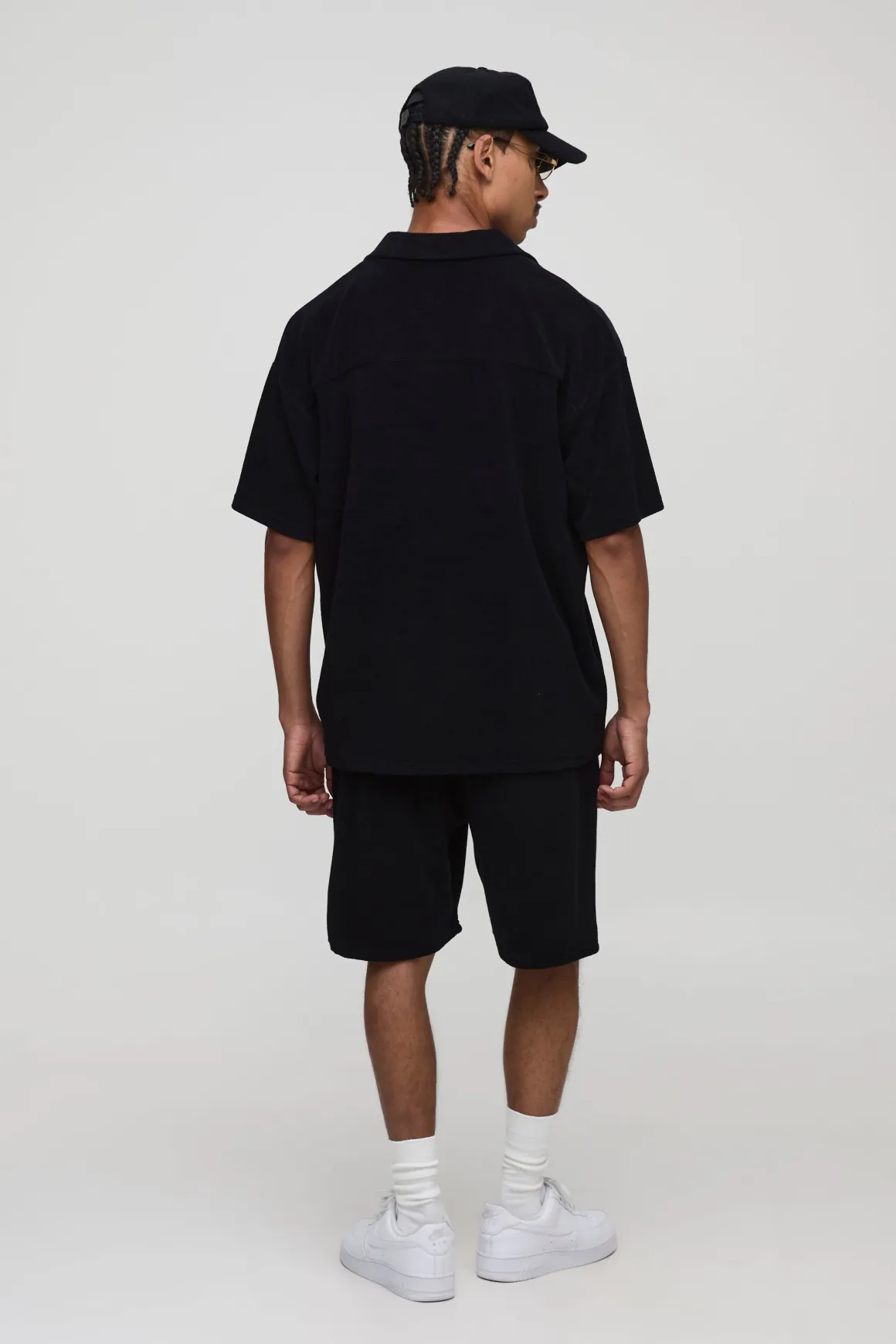 Polo en tissu éponge brodé Revere oversize noir