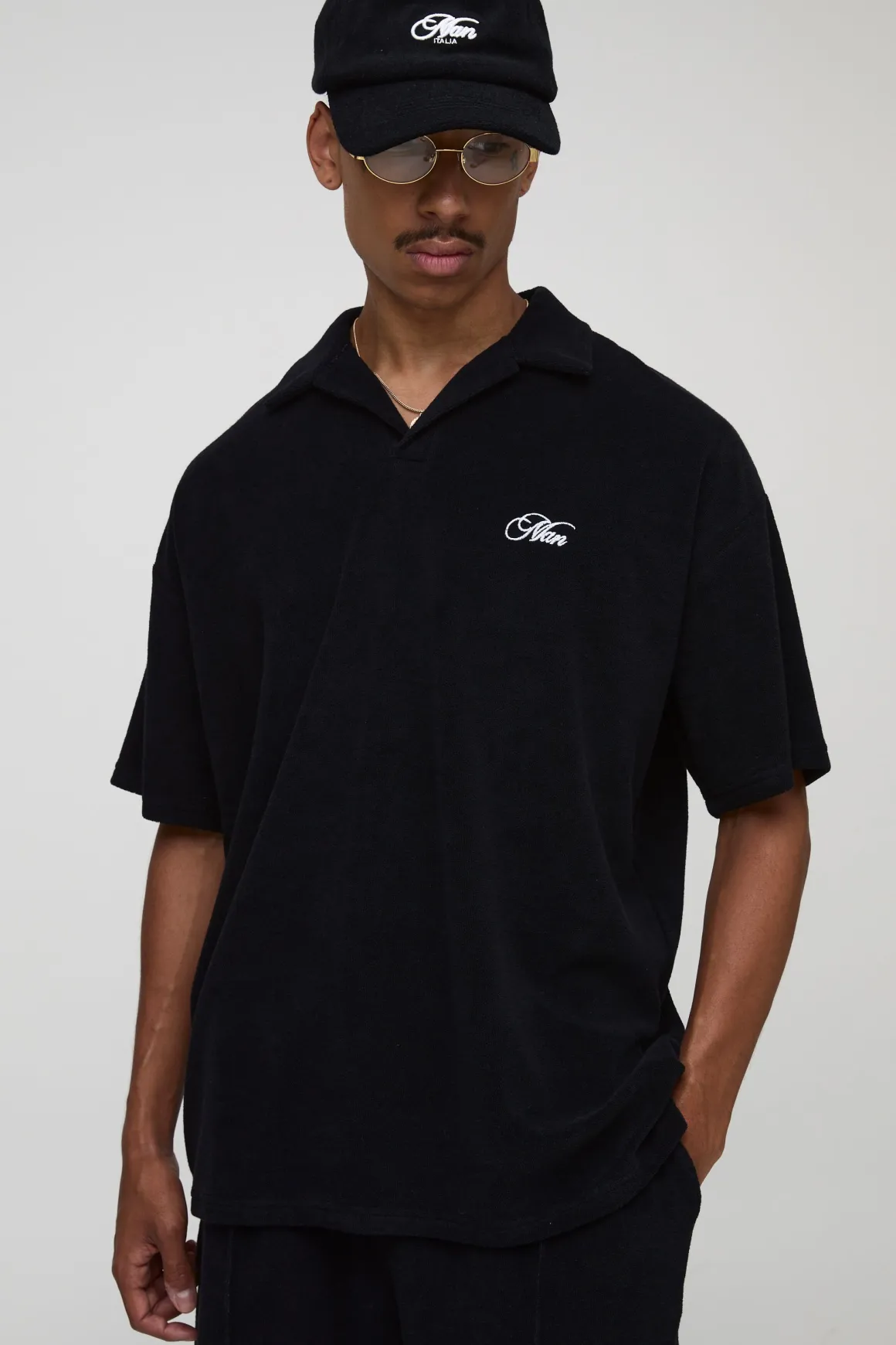 Polo en tissu éponge brodé Revere oversize noir