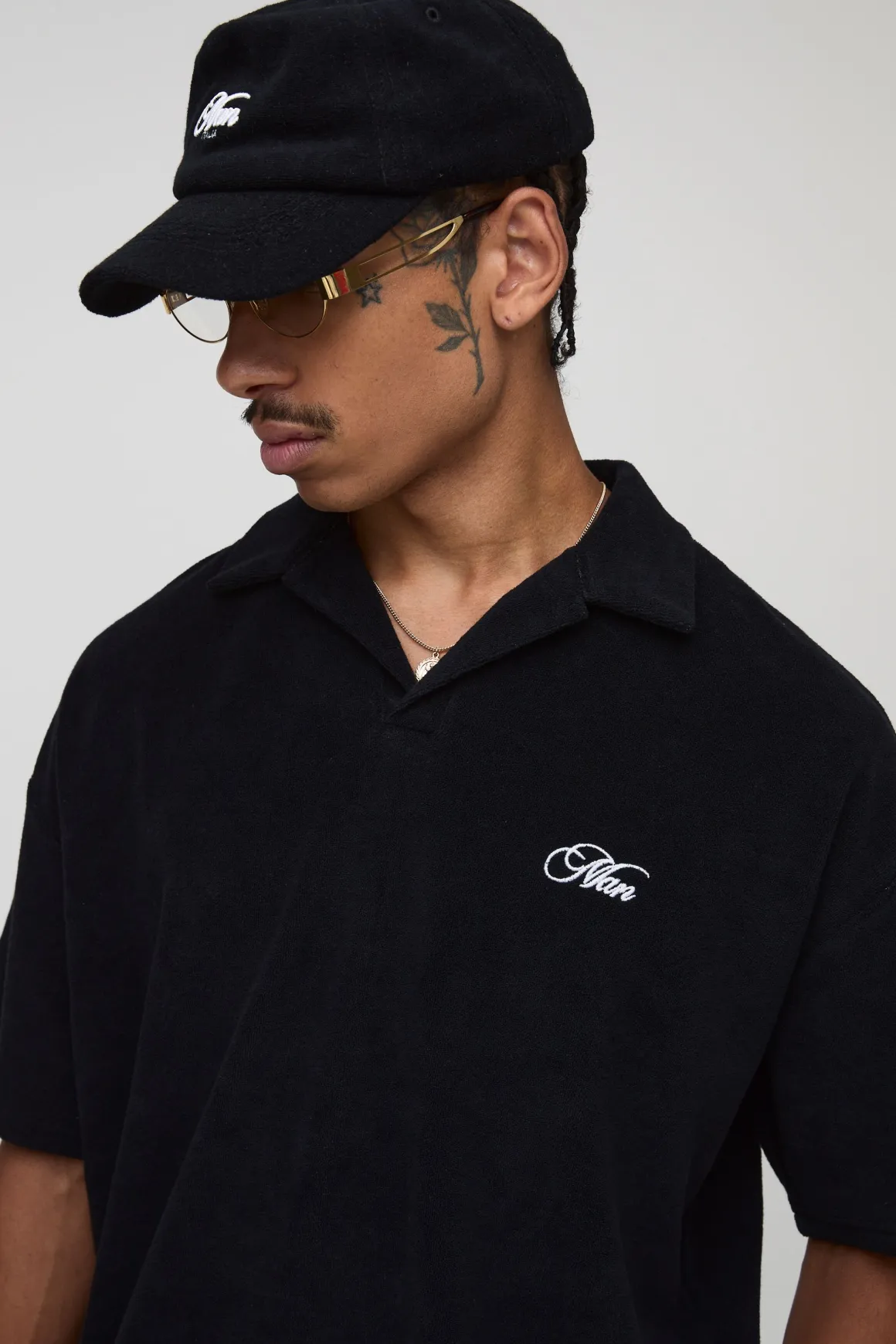 Polo en tissu éponge brodé Revere oversize noir