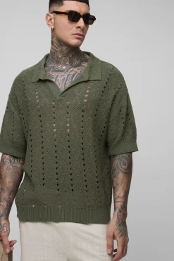 Polo long, boxy, oversize et rayé en maille ouverte