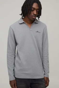 boohooMAN Polo texturé à manches longues, coupe ajustée, signature BM brodée, col en V<Homme Polos
