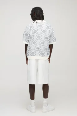 Polo tricoté au crochet surdimensionné et à coupe carrée