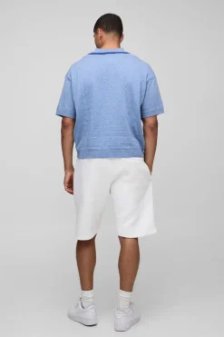 Polo tricoté en jacquard à l'allure boxy et surdimensionnée