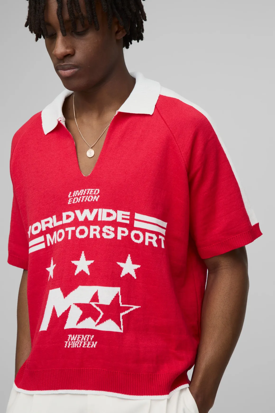 Polo tricoté jacquard moto oversize boxy