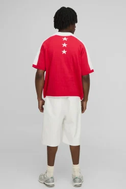 Polo tricoté jacquard moto oversize boxy