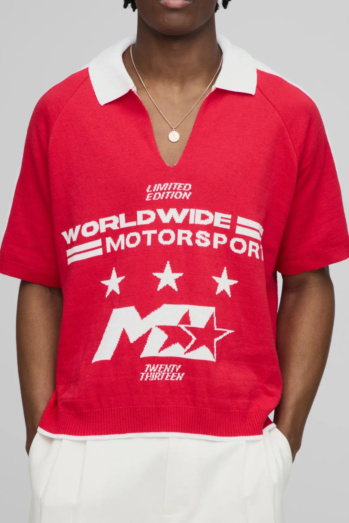 Polo tricoté jacquard moto oversize boxy