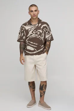 Polo Tricoté Oversize Ample À Motif Jacquard Visage Abstrait