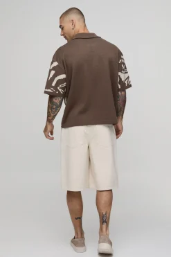 Polo Tricoté Oversize Ample À Motif Jacquard Visage Abstrait
