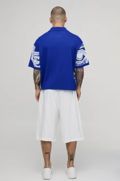 Polo Tricoté Oversize Ample À Motif Jacquard Visage Abstrait