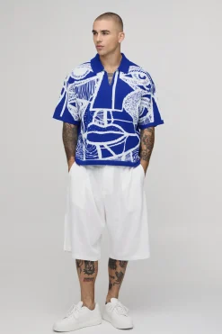 Polo Tricoté Oversize Ample À Motif Jacquard Visage Abstrait