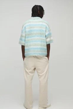 Polo tricoté surdimensionné à rayures brossées à manches courtes