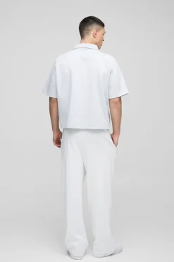 Polo zip raglan en tissu scuba à coupe régulière