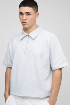 Polo zip raglan en tissu scuba à coupe régulière