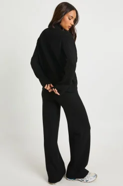 Pull à col montant tricoté à câbles à glissière intégrale et pantalon à jambe droite coordonnés