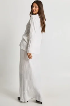 Pull à col rond en maille côtelée douce et jupe maxi coordonnée