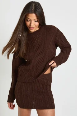 Pull à col rond en maille torsadée et mini-jupe