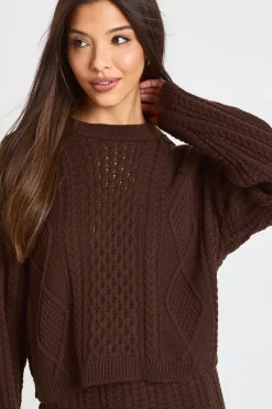 Pull à col rond en maille torsadée et mini-jupe