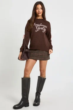 Pull de Noël à nœud féminin